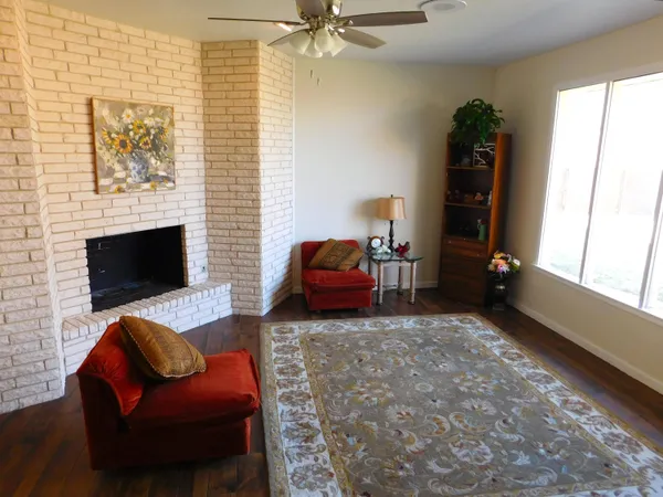 a view of kitchen with livingroom and hardwood floor