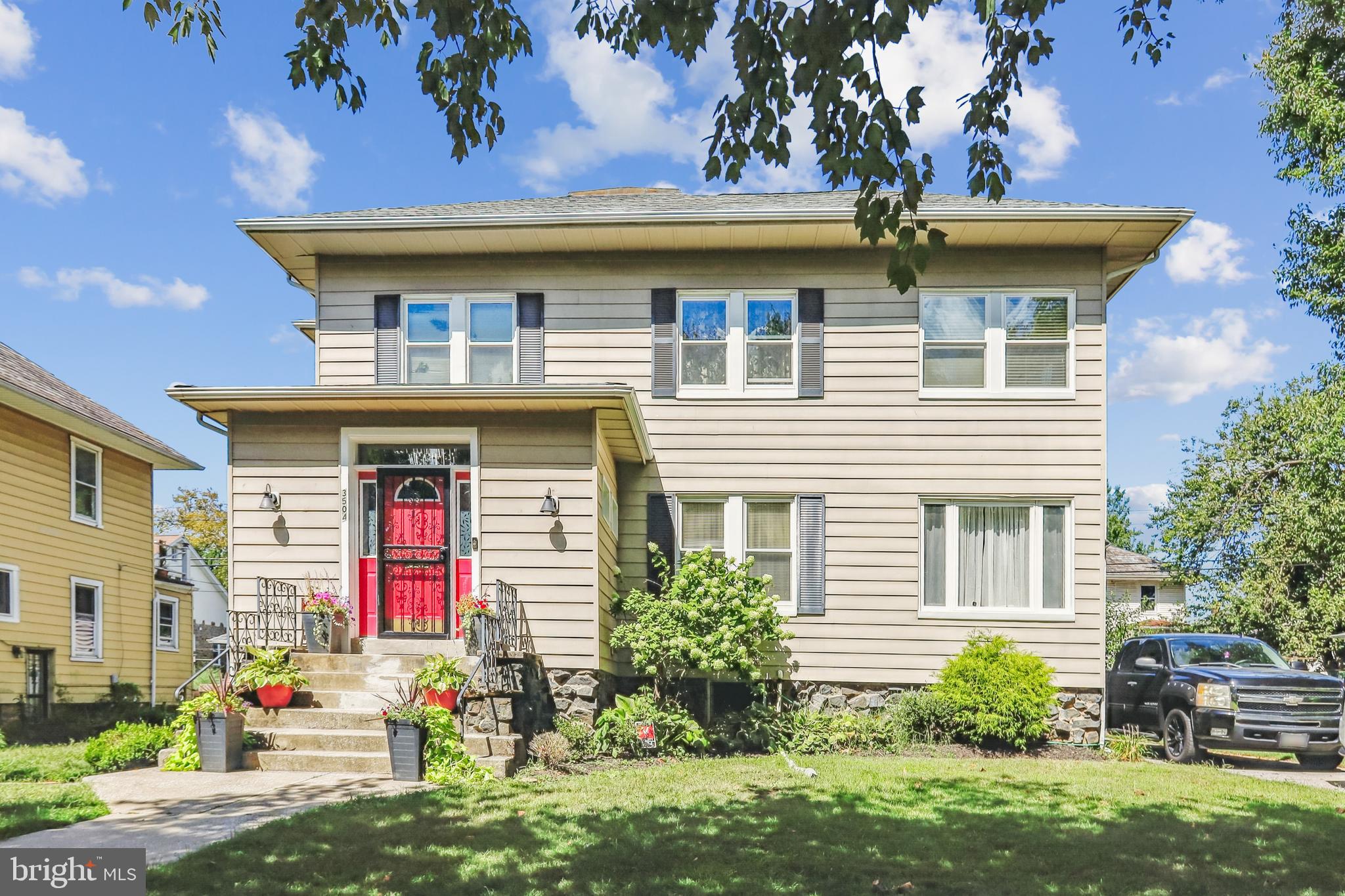 a front view of a house with yard