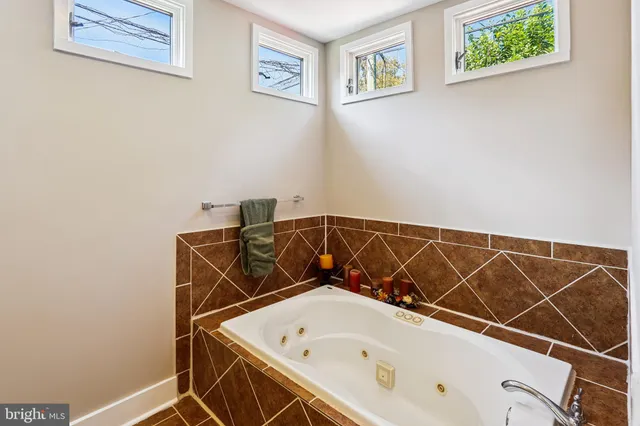a utility room with a bathtub