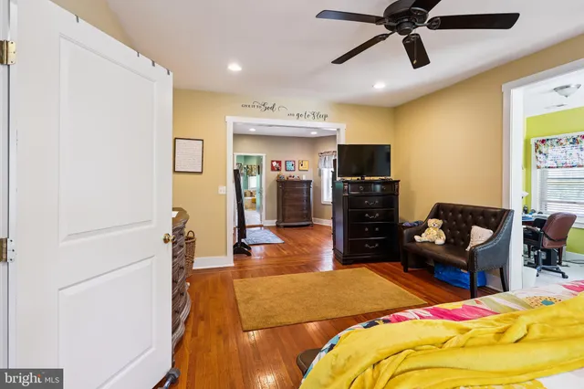 a bedroom with a bed and furniture