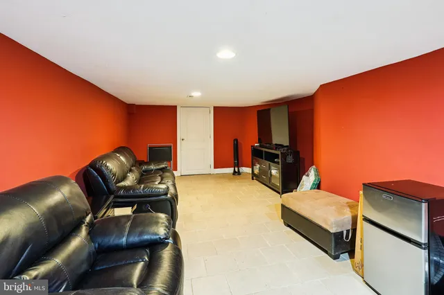 a outdoor living space with furniture and a potted plant