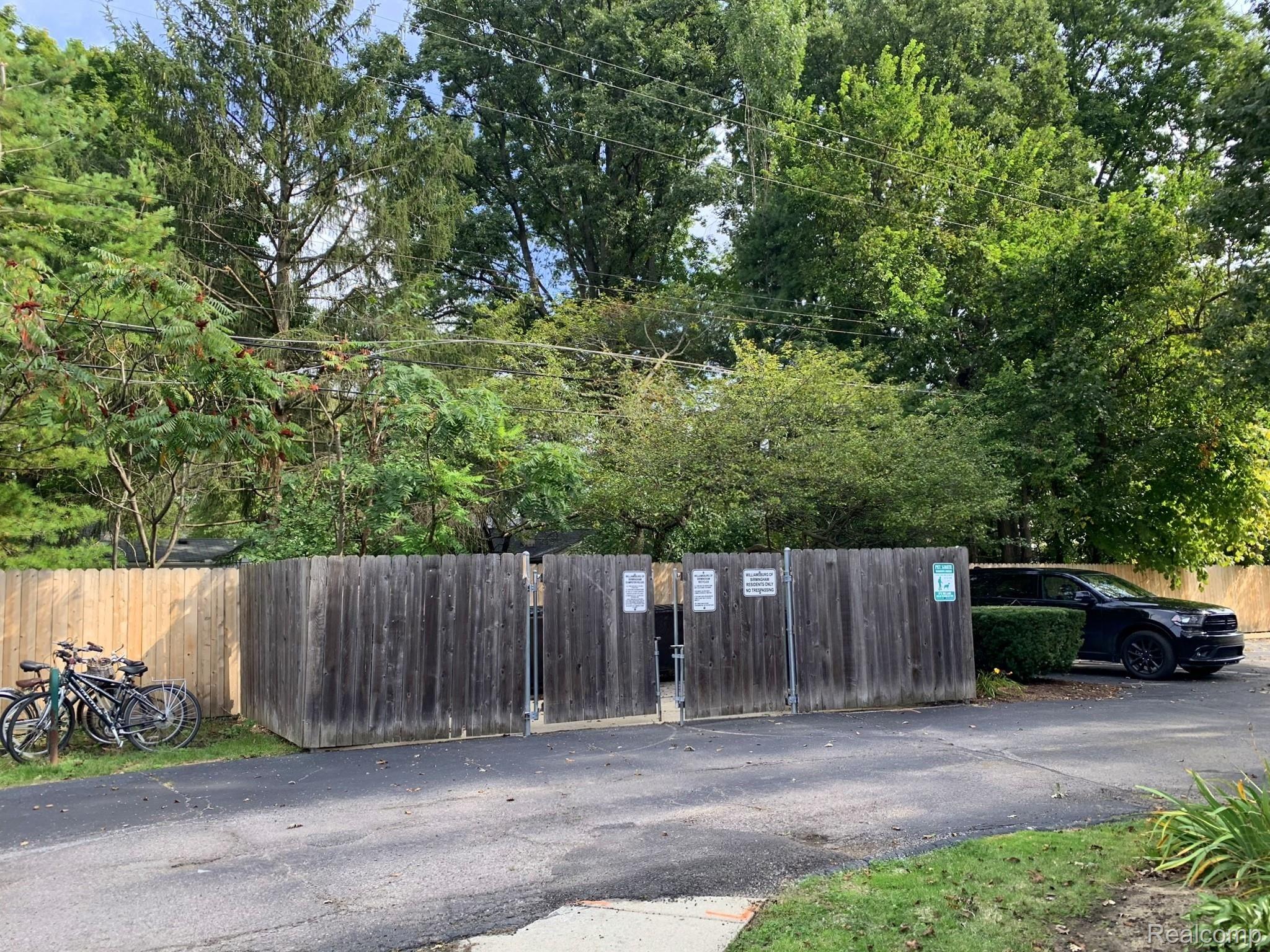 1641 Graefield Road, Unit 100 Birmingham, MI 48009 - Photo 19 of 20 Parking and bike racks just steps from private back door.