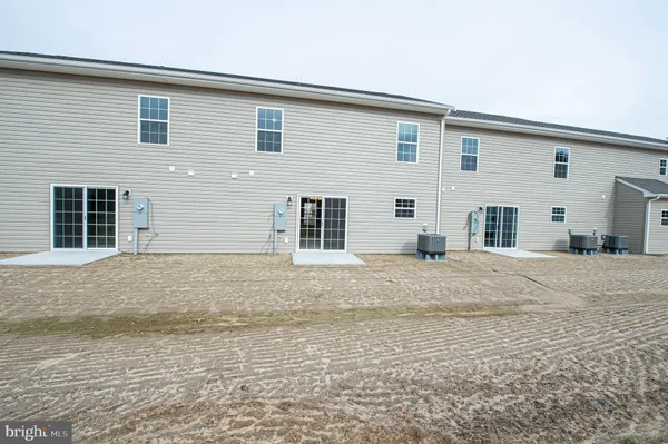 a view of back yard of the house
