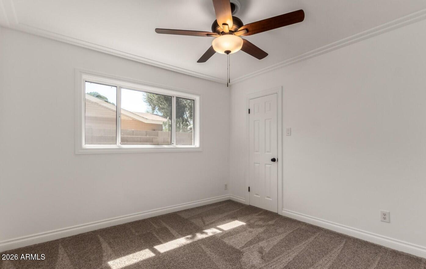 607 West 15th Street Tempe, AZ 85281 - Photo 21 of 29 a view of an empty room with a window