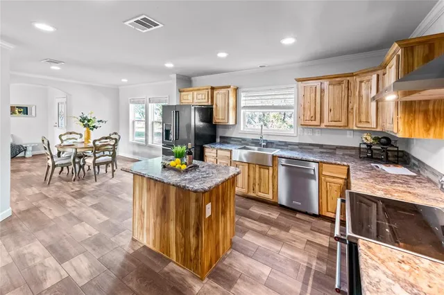 a front view of a house with yard