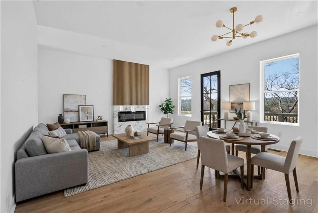 160 Railroad Street Canton, GA 30114 - Photo 2 of 35 a living room with furniture and a large window