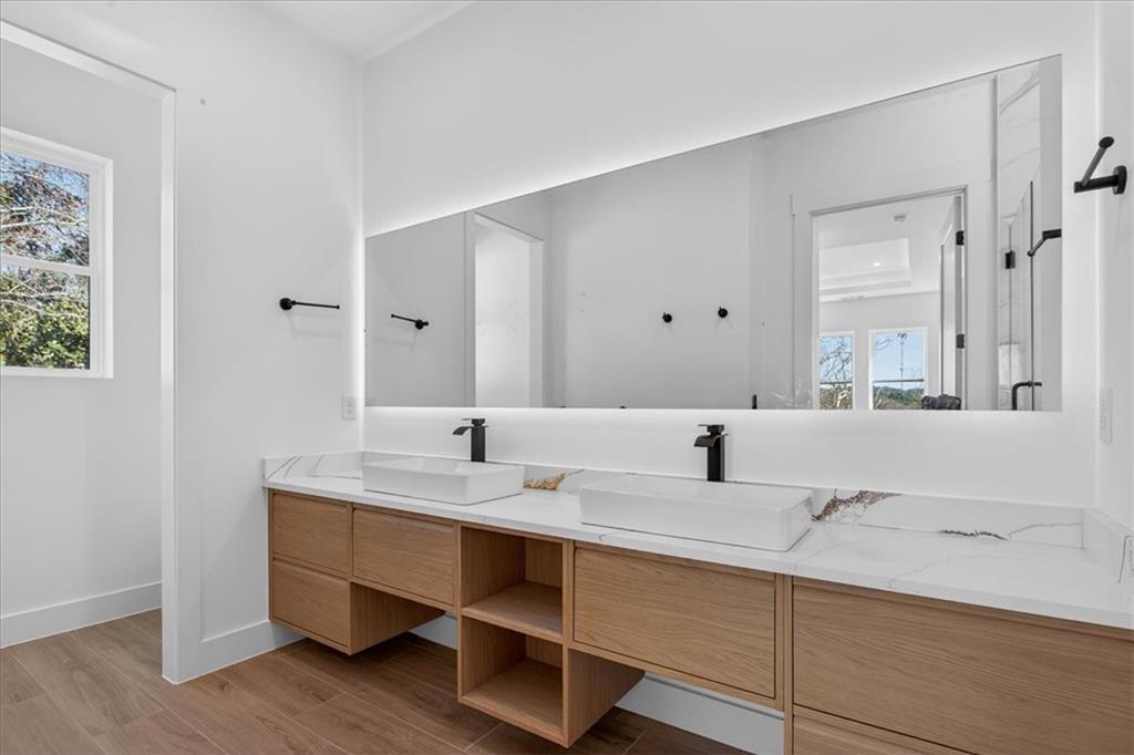 160 Railroad Street Canton, GA 30114 - Photo 23 of 35 a bathroom with a double vanity sink and a mirror
