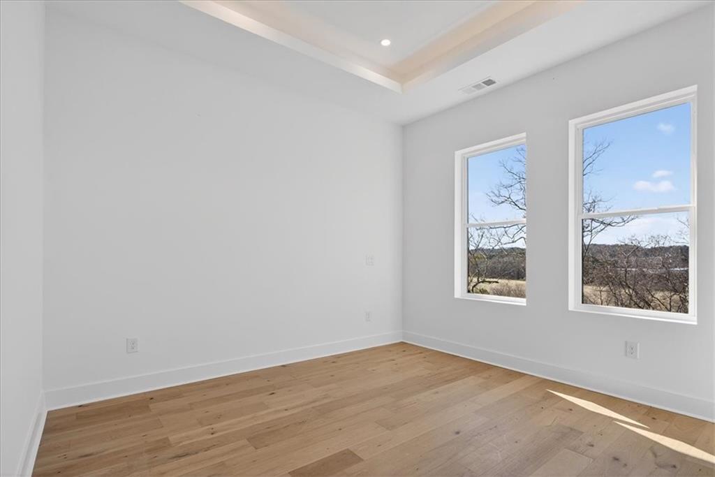 160 Railroad Street Canton, GA 30114 - Photo 25 of 35 an empty room with a window