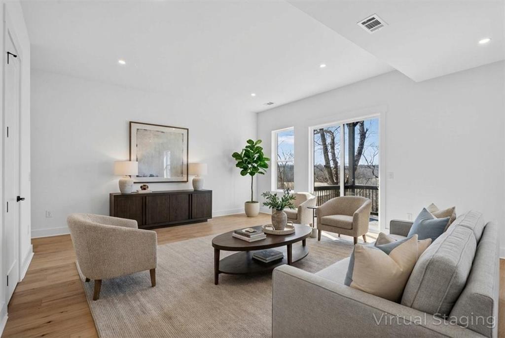 160 Railroad Street Canton, GA 30114 - Photo 27 of 35 a living room with furniture and wooden floor