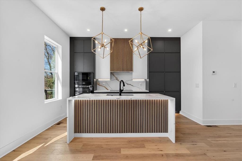 160 Railroad Street Canton, GA 30114 - Photo 3 of 35 a spacious bathroom with a granite countertop sink and a mirror