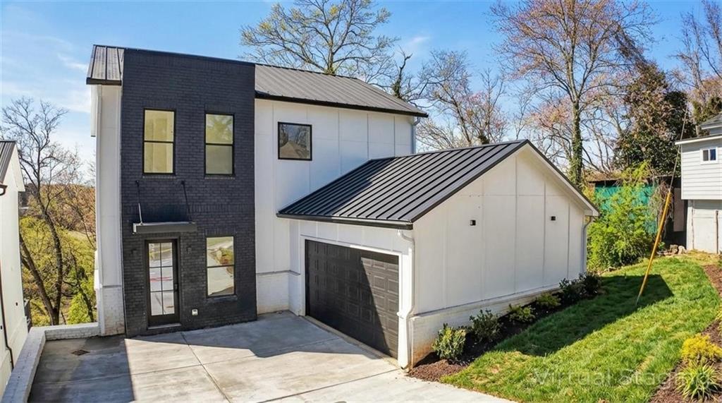 160 Railroad Street Canton, GA 30114 - Photo 5 of 35 a front view of a house with a yard