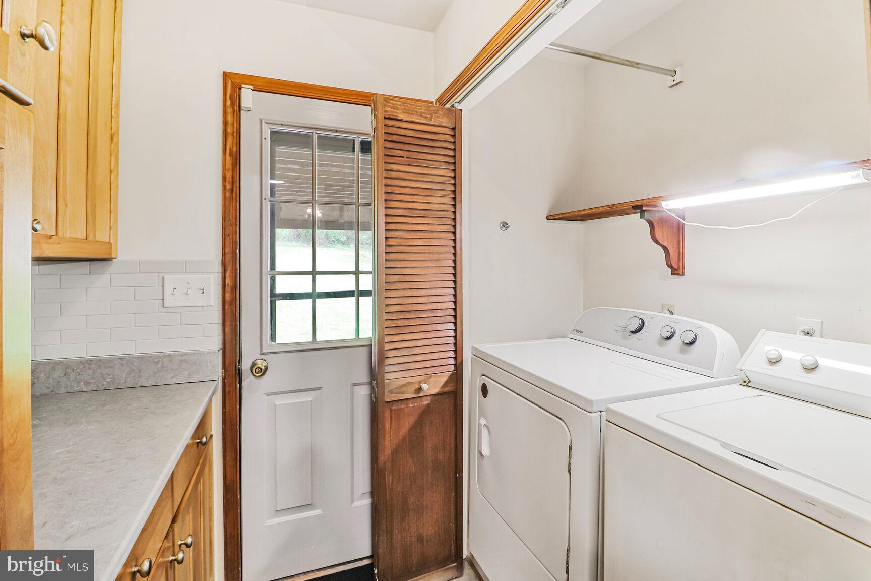989 Ridge Road Finksburg, MD 21048 - Photo 30 of 50 a utility room with dryer and washer