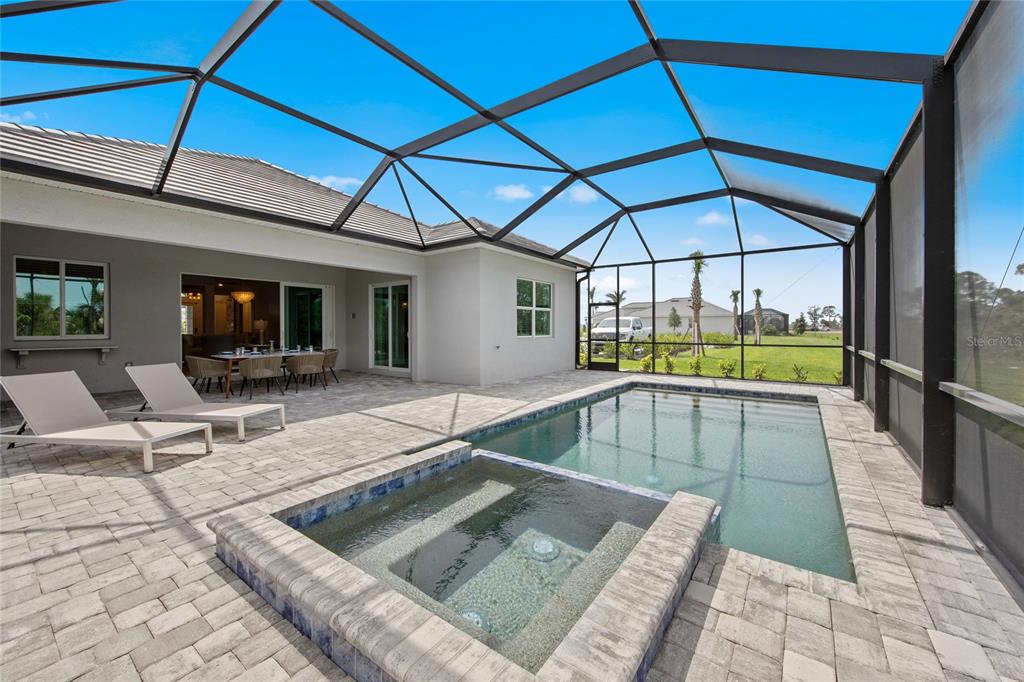 7161 Inlet Isles Lakewood Ranch, FL 34202 - Photo 27 of 29 a view of swimming pool with seating area