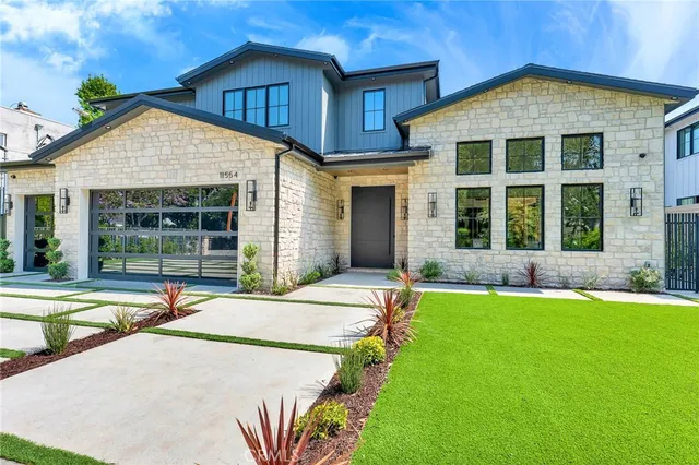 a front view of a house having yard