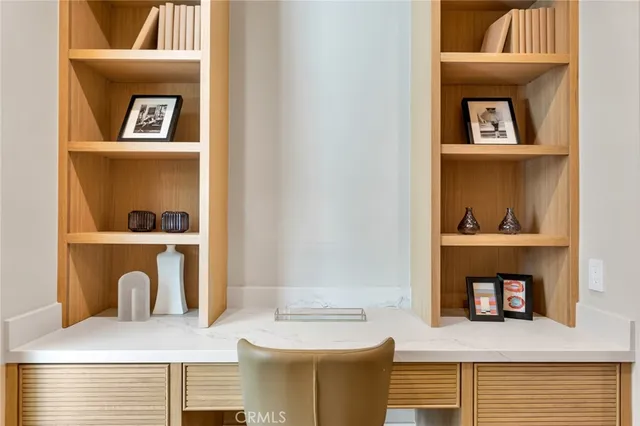 a bathroom with a granite countertop sink toilet a large mirror a bathtub and shower