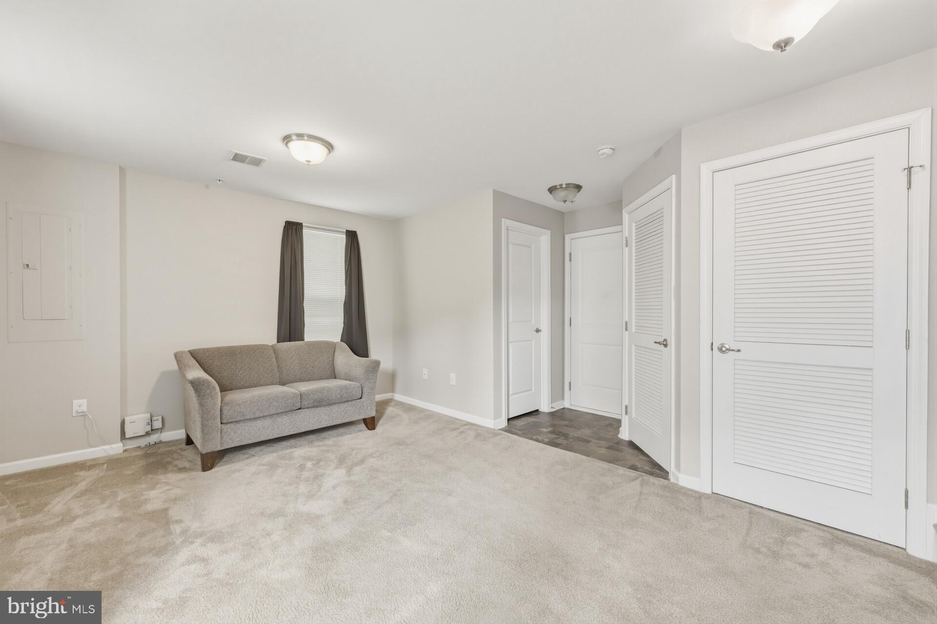 325 Schmidt Road Phoenixville, PA 19460 - Photo 8 of 27 a living room with furniture and a couch