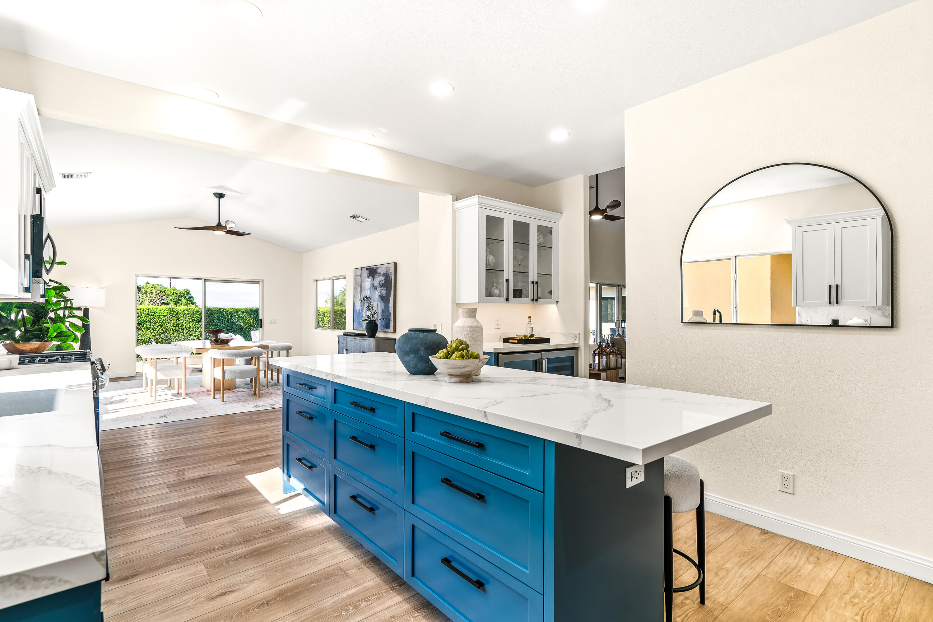 67980 Foothill Road Cathedral City, CA 92234 - Photo 19 of 60 a living room with kitchen island furniture and a kitchen view