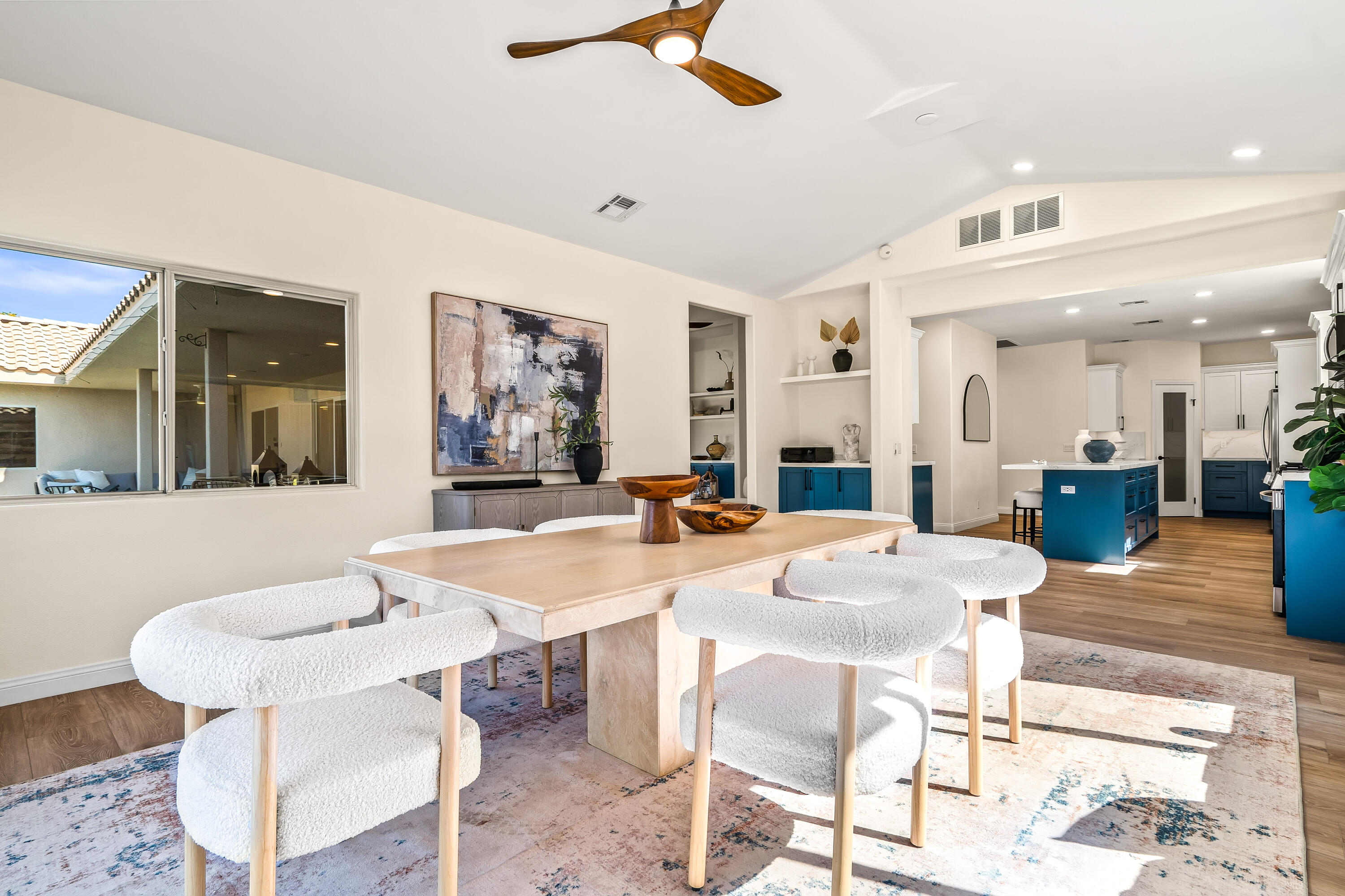 67980 Foothill Road Cathedral City, CA 92234 - Photo 22 of 60 a dining hall with stainless steel appliances kitchen island a table and chairs