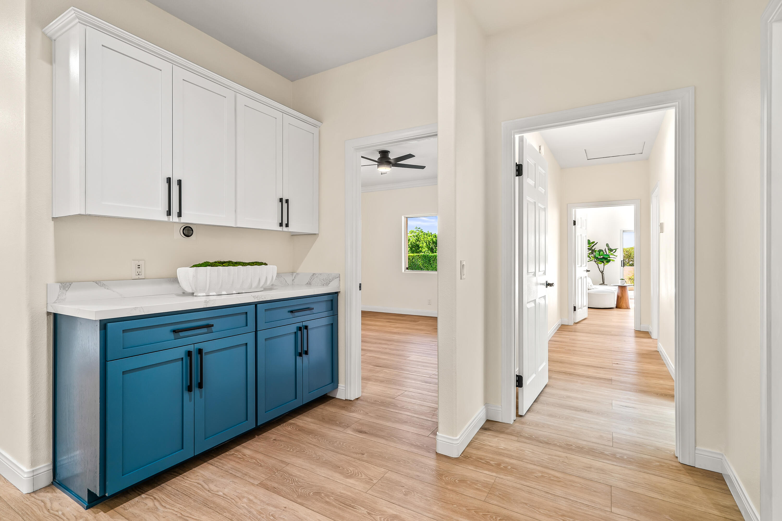 67980 Foothill Road Cathedral City, CA 92234 - Photo 28 of 60 a view of a kitchen cabinets and wooden floor