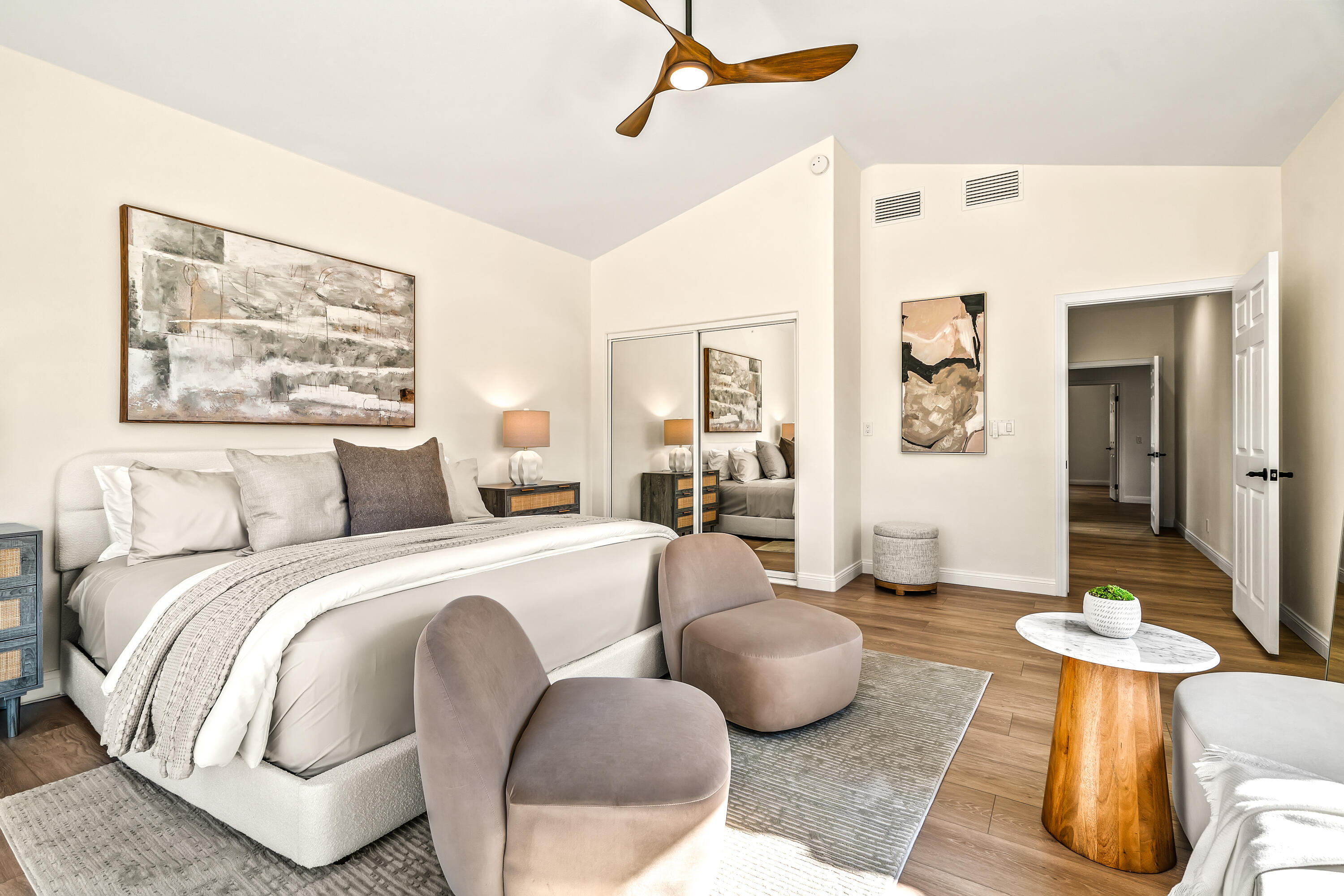 67980 Foothill Road Cathedral City, CA 92234 - Photo 34 of 60 a spacious bedroom with a bed and couch