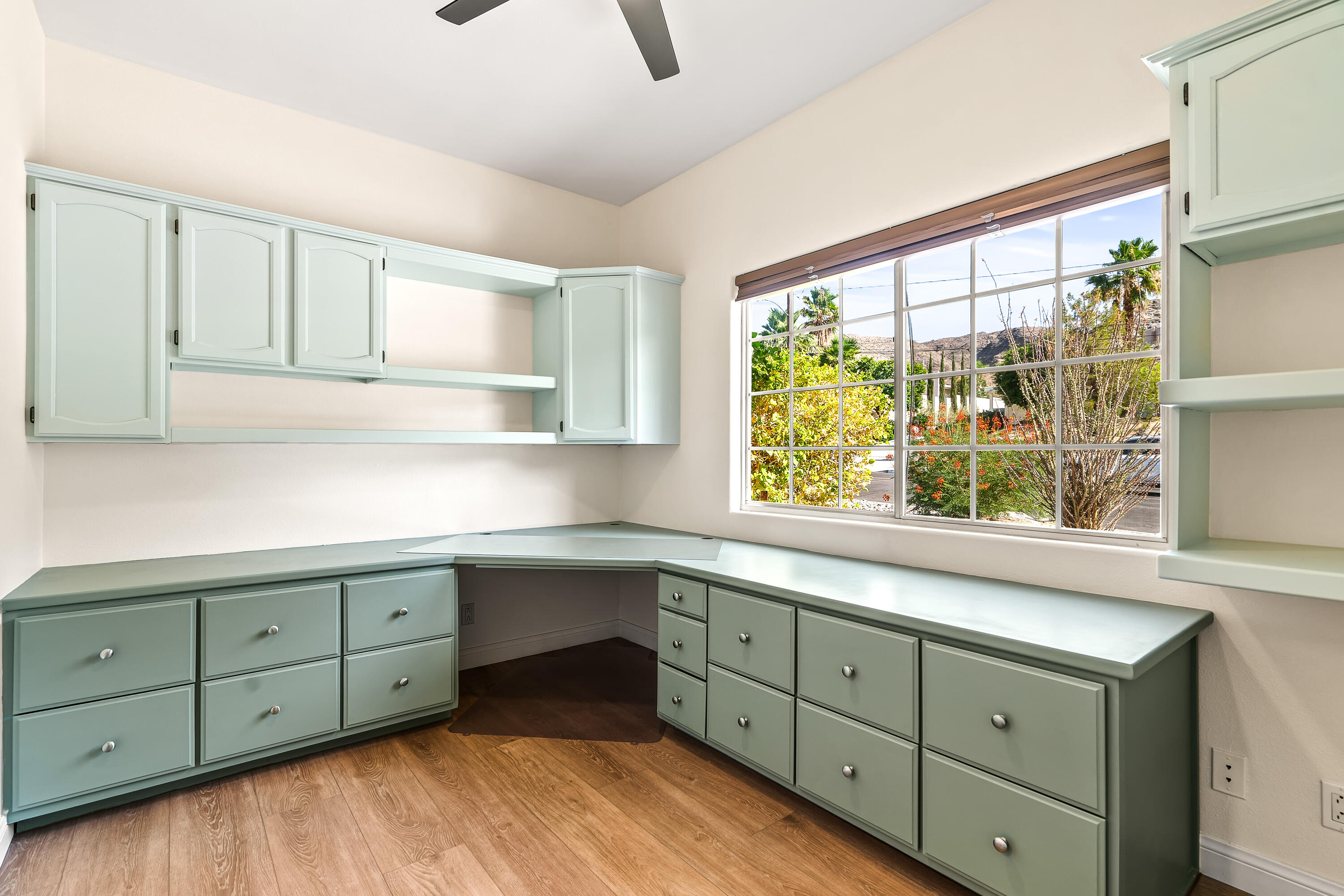67980 Foothill Road Cathedral City, CA 92234 - Photo 39 of 60 a kitchen with sink cabinets and window