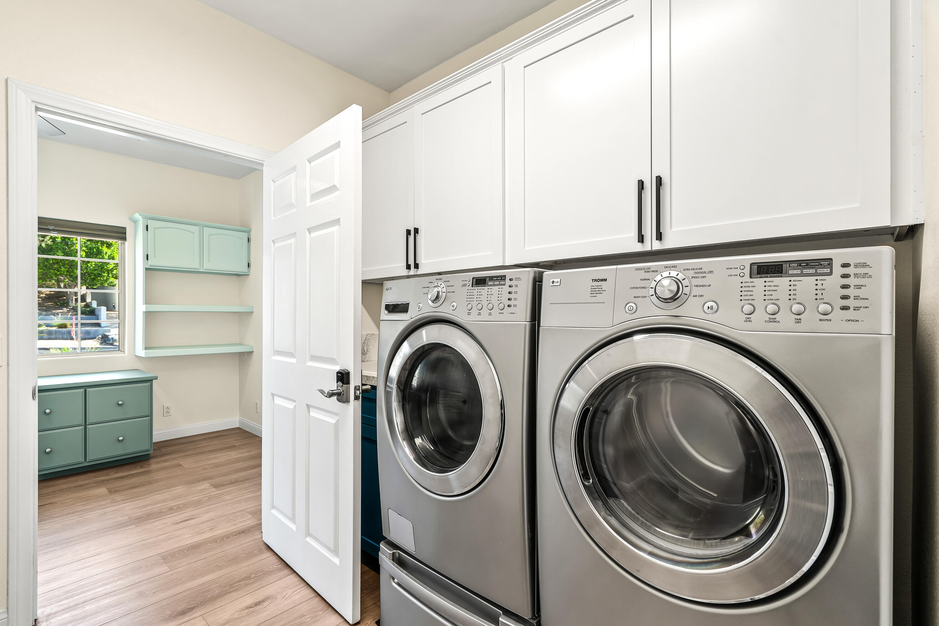 67980 Foothill Road Cathedral City, CA 92234 - Photo 40 of 60 a utility room with sink dryer and washer