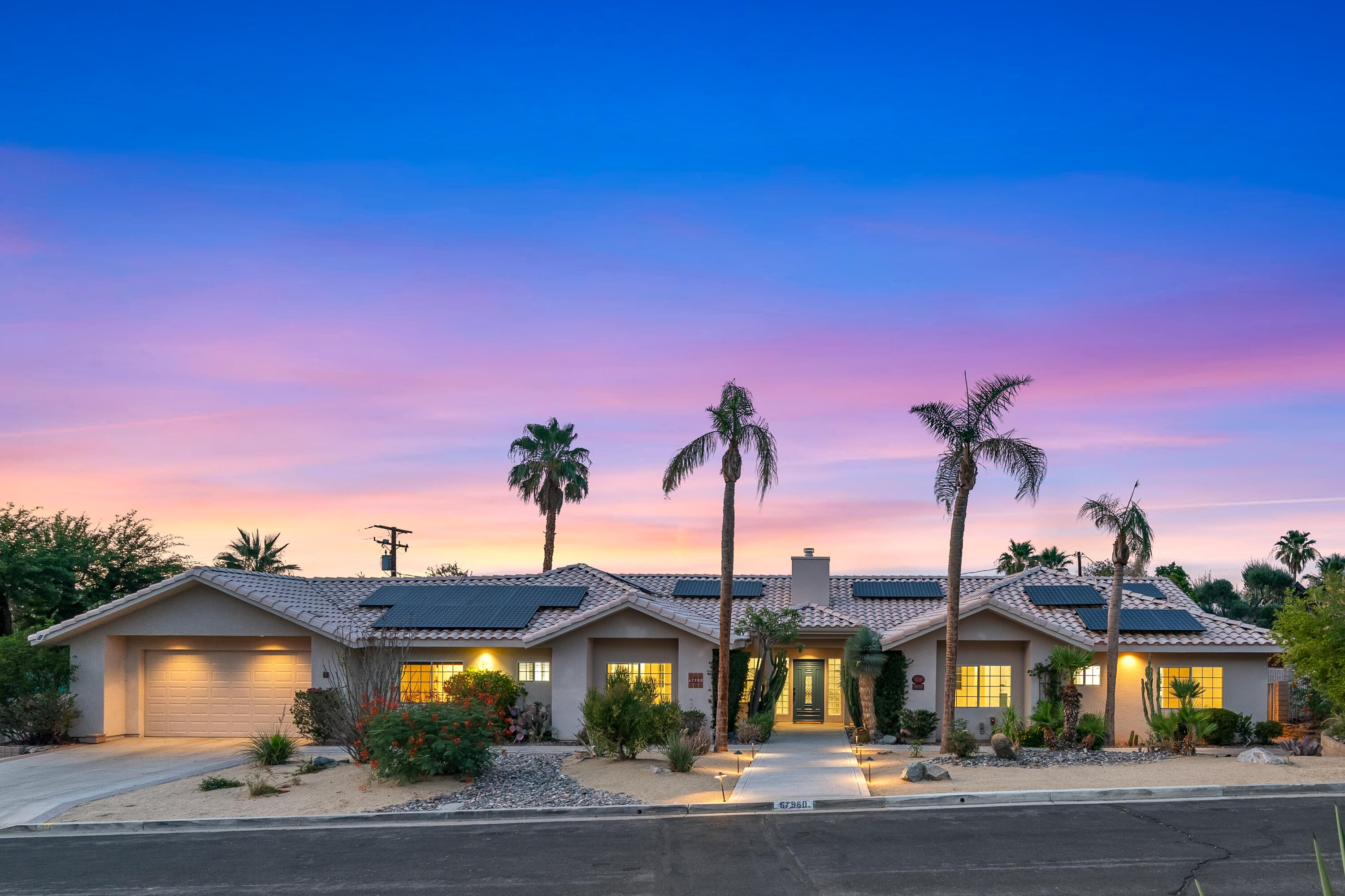 67980 Foothill Road Cathedral City, CA 92234 - Photo 4 of 60 a front view of a house with a yard