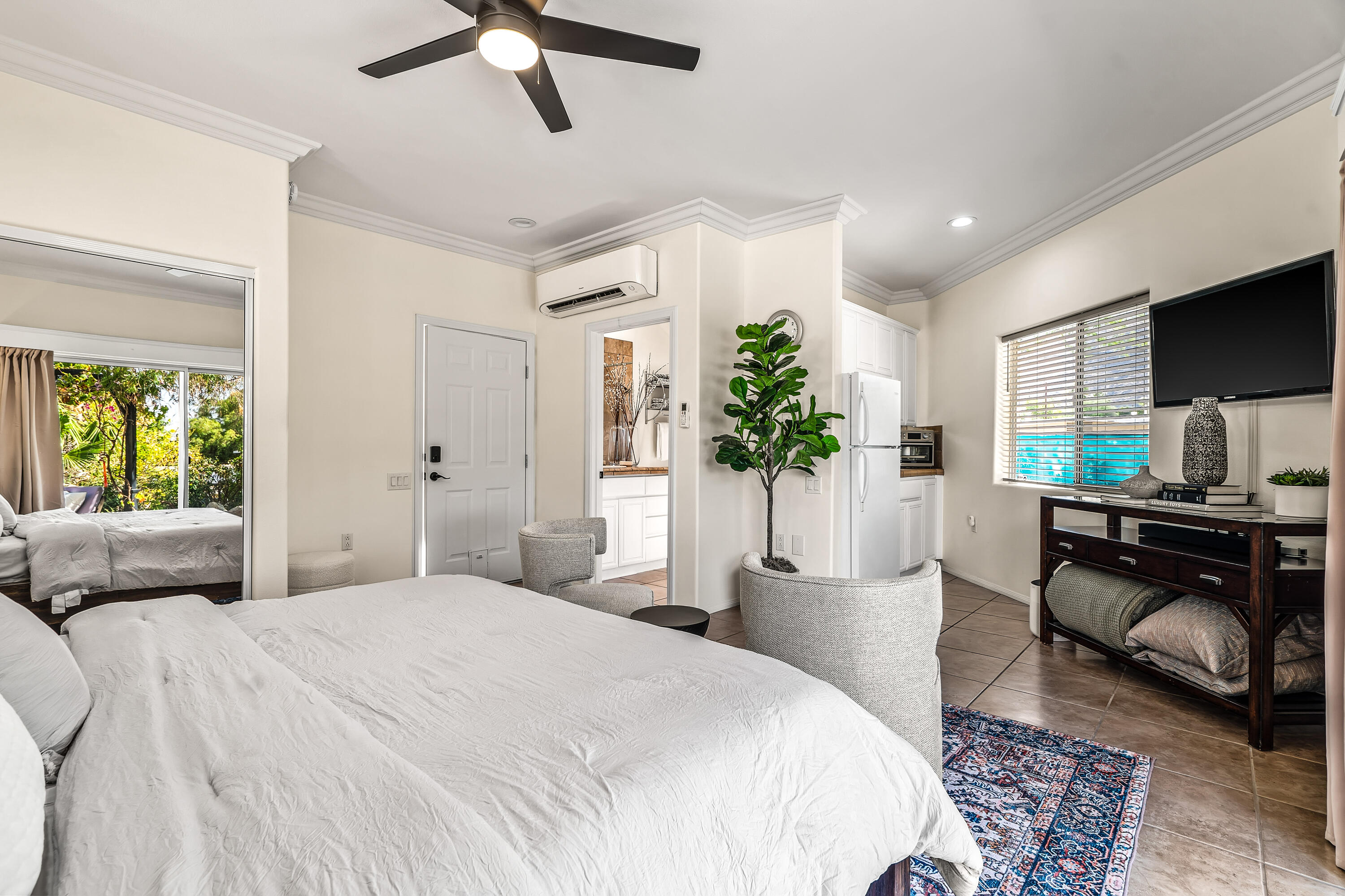 67980 Foothill Road Cathedral City, CA 92234 - Photo 45 of 60 a bedroom with a bed and a couch