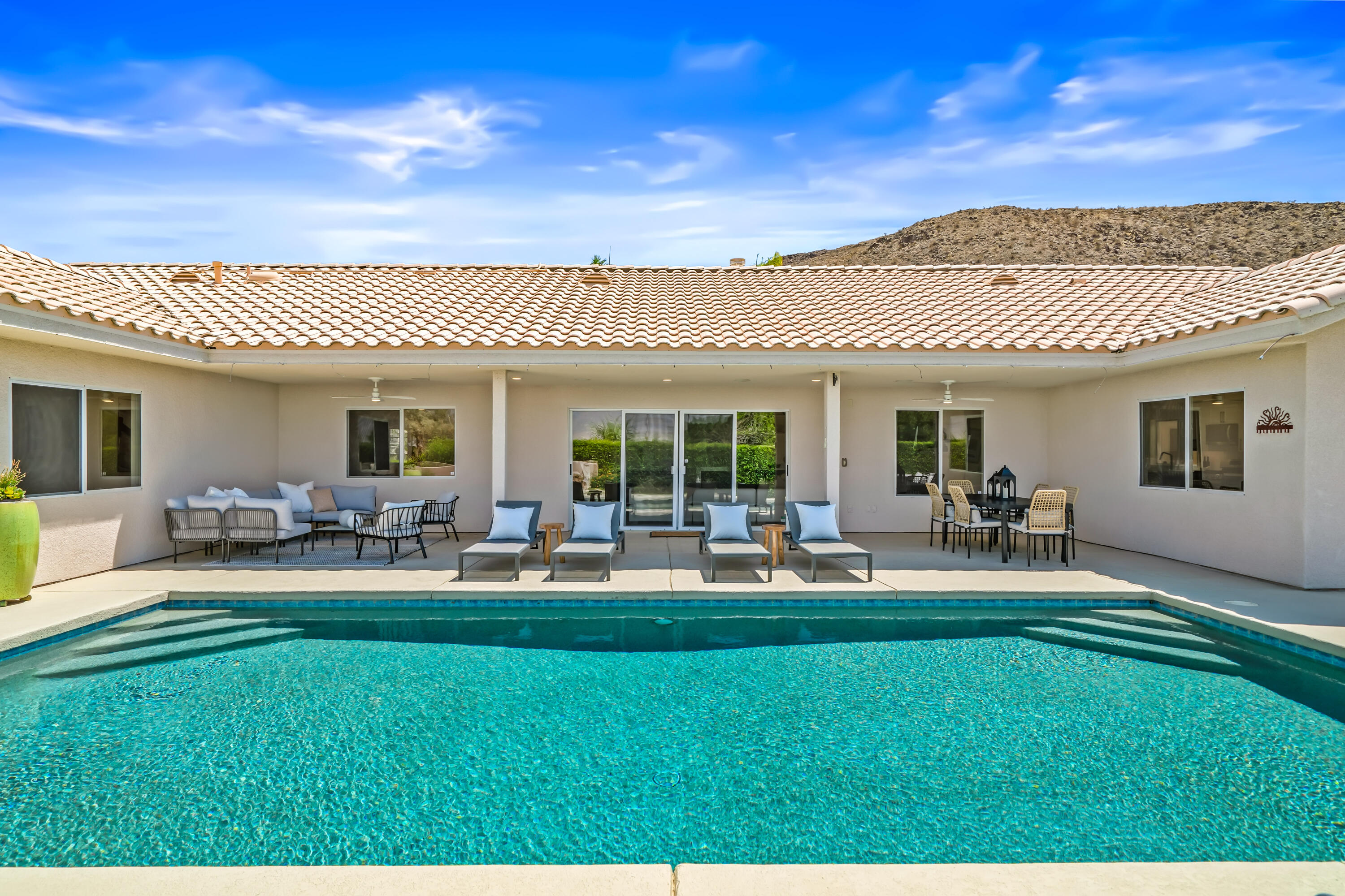 67980 Foothill Road Cathedral City, CA 92234 - Photo 47 of 60 a house view with a sitting space and garden