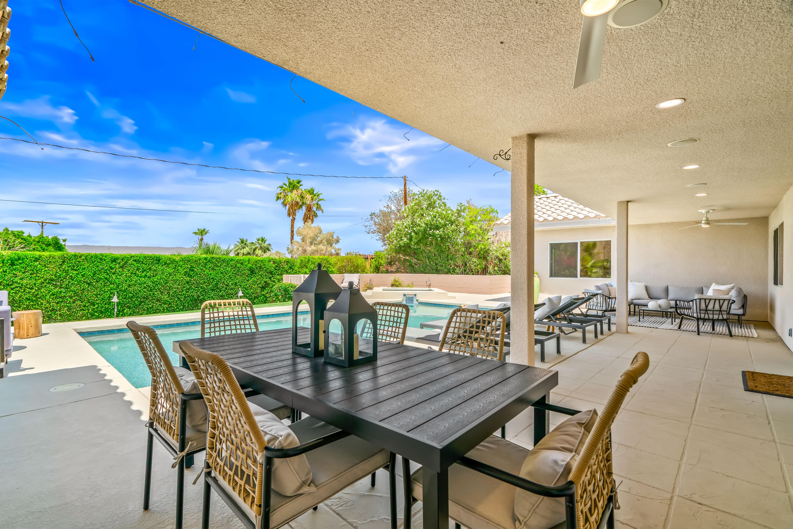 67980 Foothill Road Cathedral City, CA 92234 - Photo 50 of 60 a view of a dining table and chairs in the patio