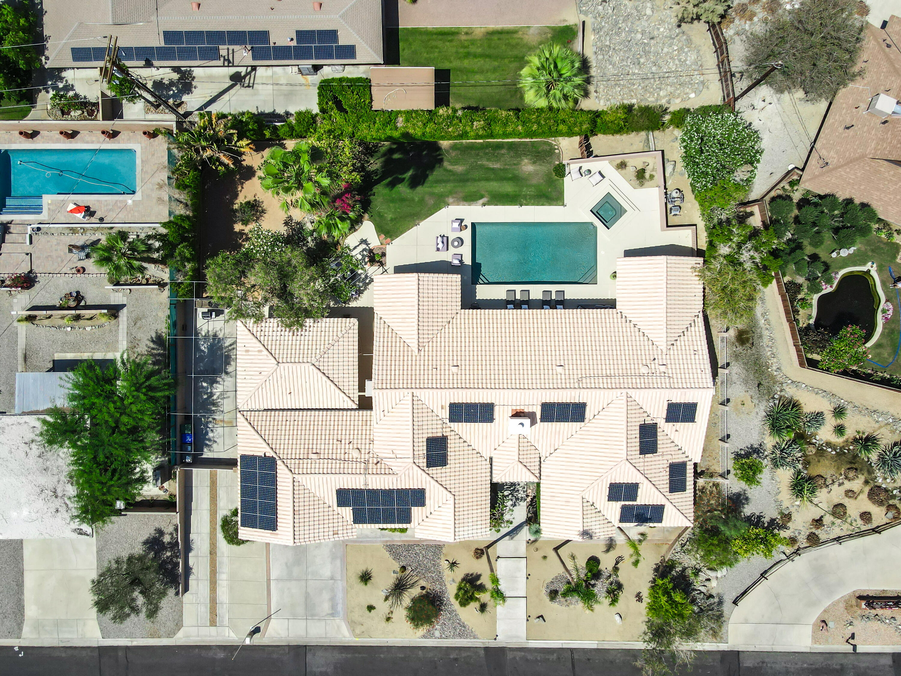 67980 Foothill Road Cathedral City, CA 92234 - Photo 59 of 60 an aerial view of a house with a yard and large trees