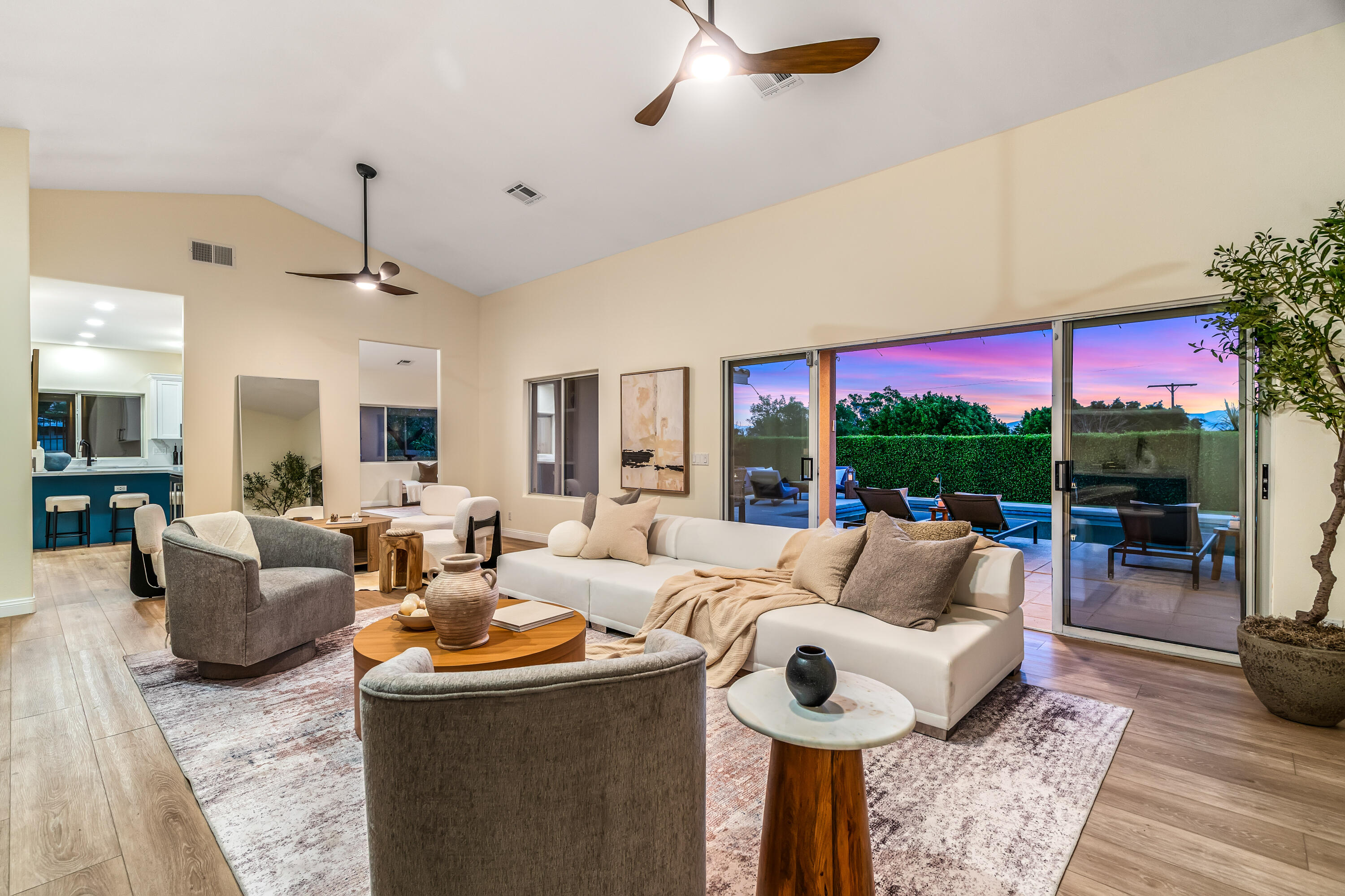 67980 Foothill Road Cathedral City, CA 92234 - Photo 7 of 60 a living room with fireplace furniture and a floor to ceiling window
