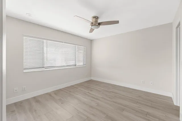 a view of a room that has a window in it