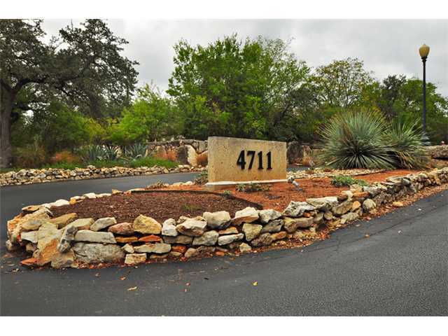 4711 Spicewood Springs Road, Unit 168 Austin, TX 78759 - Photo 1 of 1 a view of a house with yard and sitting area