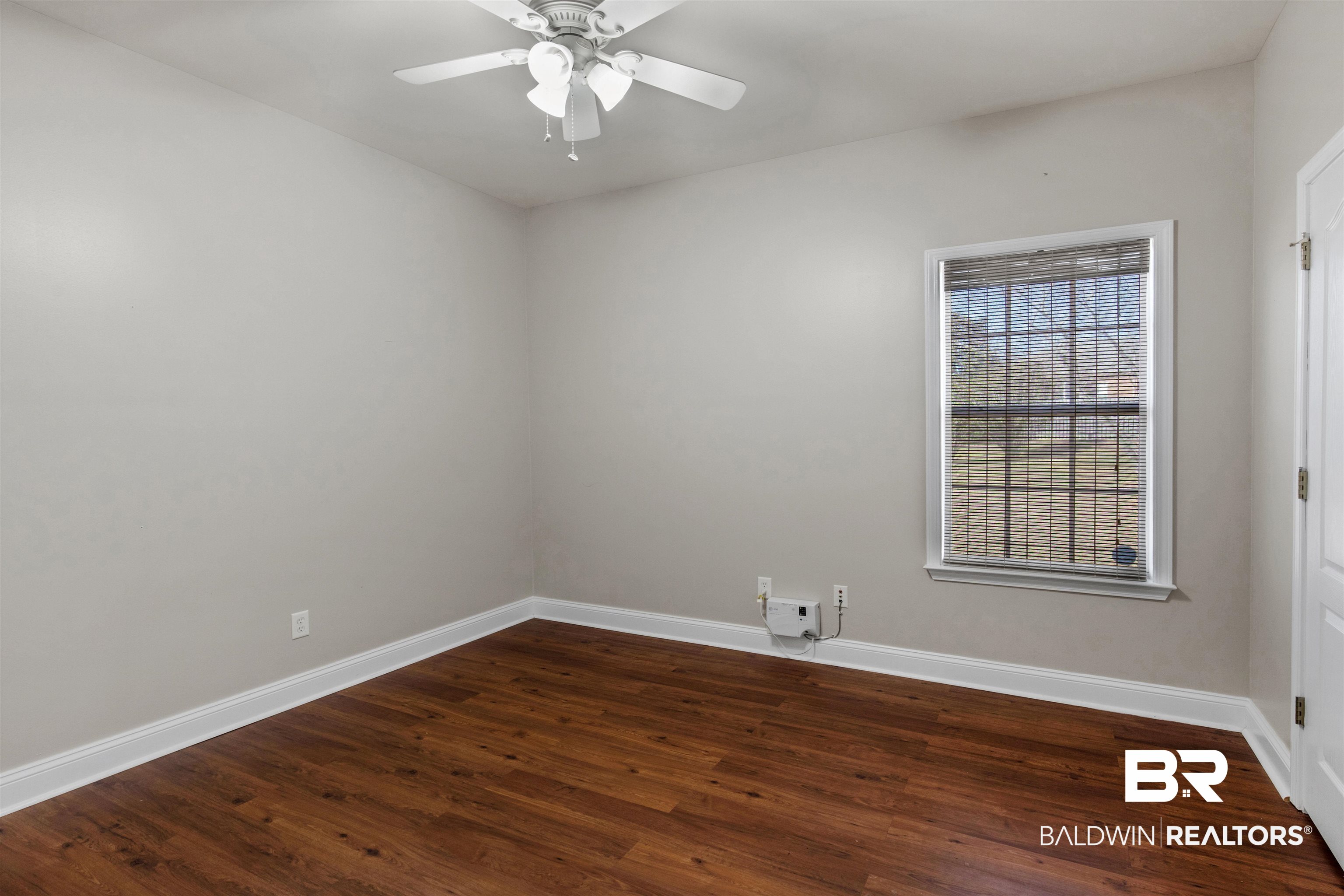 330 Allison Court Mobile, AL 36608 - Photo 18 of 27 Unfurnished room with dark wood-type flooring and ceiling fan