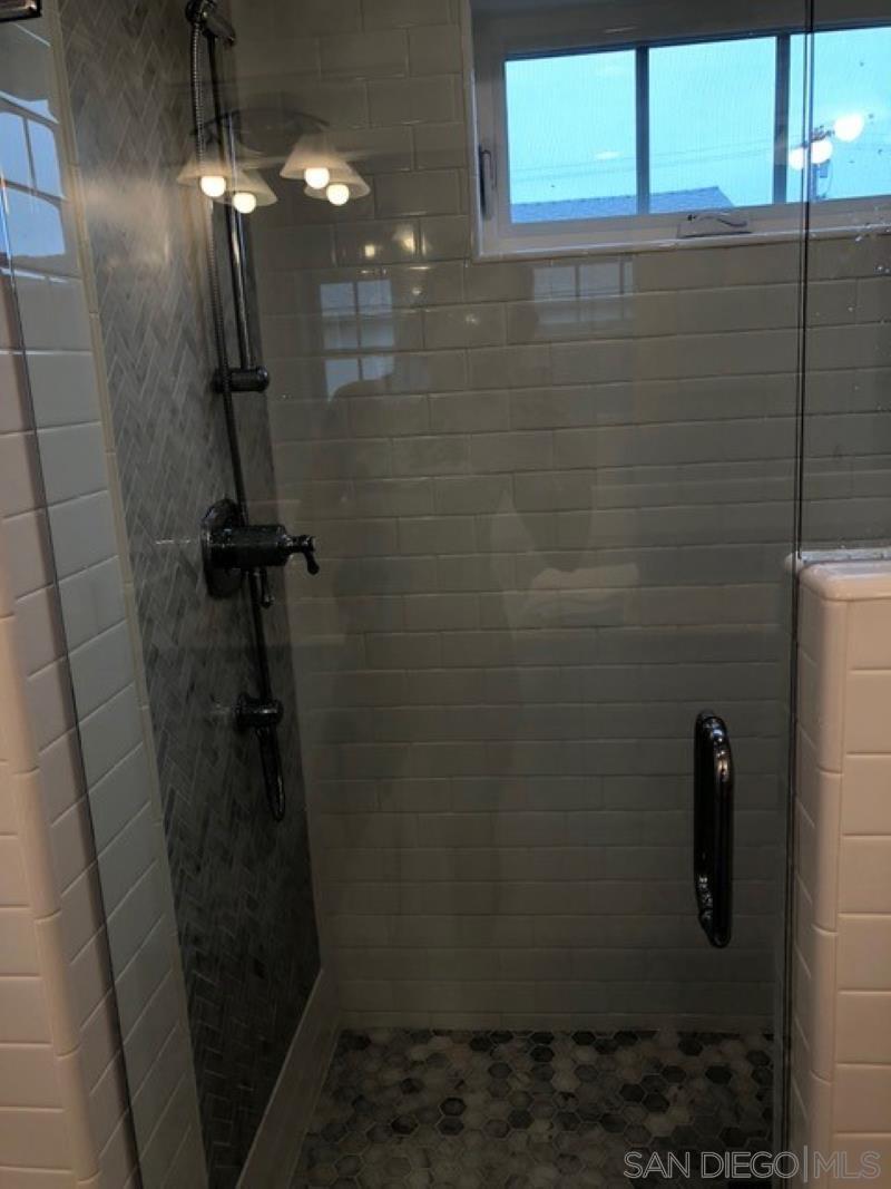 453 E Avenue Coronado, CA 92118 - Photo 11 of 16 a bathroom with a shower