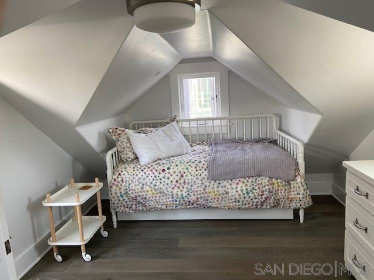 453 E Avenue Coronado, CA 92118 - Photo 16 of 16 a bedroom with a bed and window
