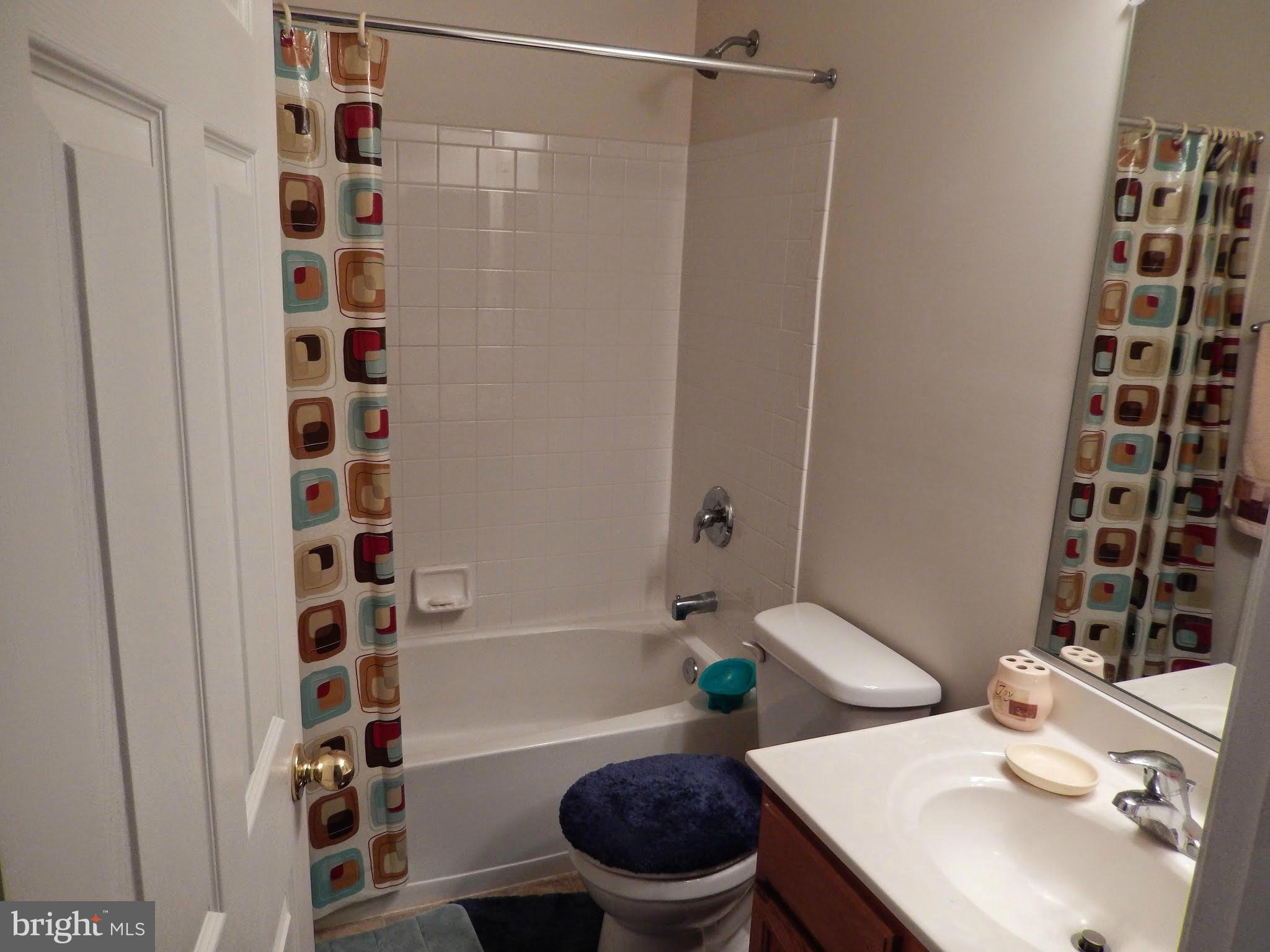 1951 Waltman Road Edgewood, MD 21040 - Photo 13 of 20 a bathroom with a sink toilet and shower