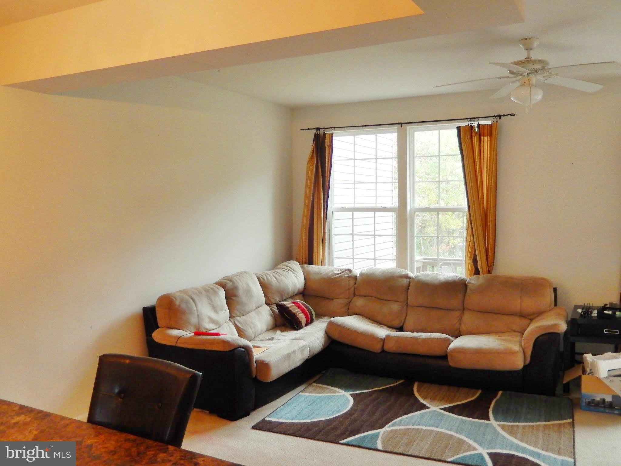 1951 Waltman Road Edgewood, MD 21040 - Photo 8 of 20 a living room with furniture and a window