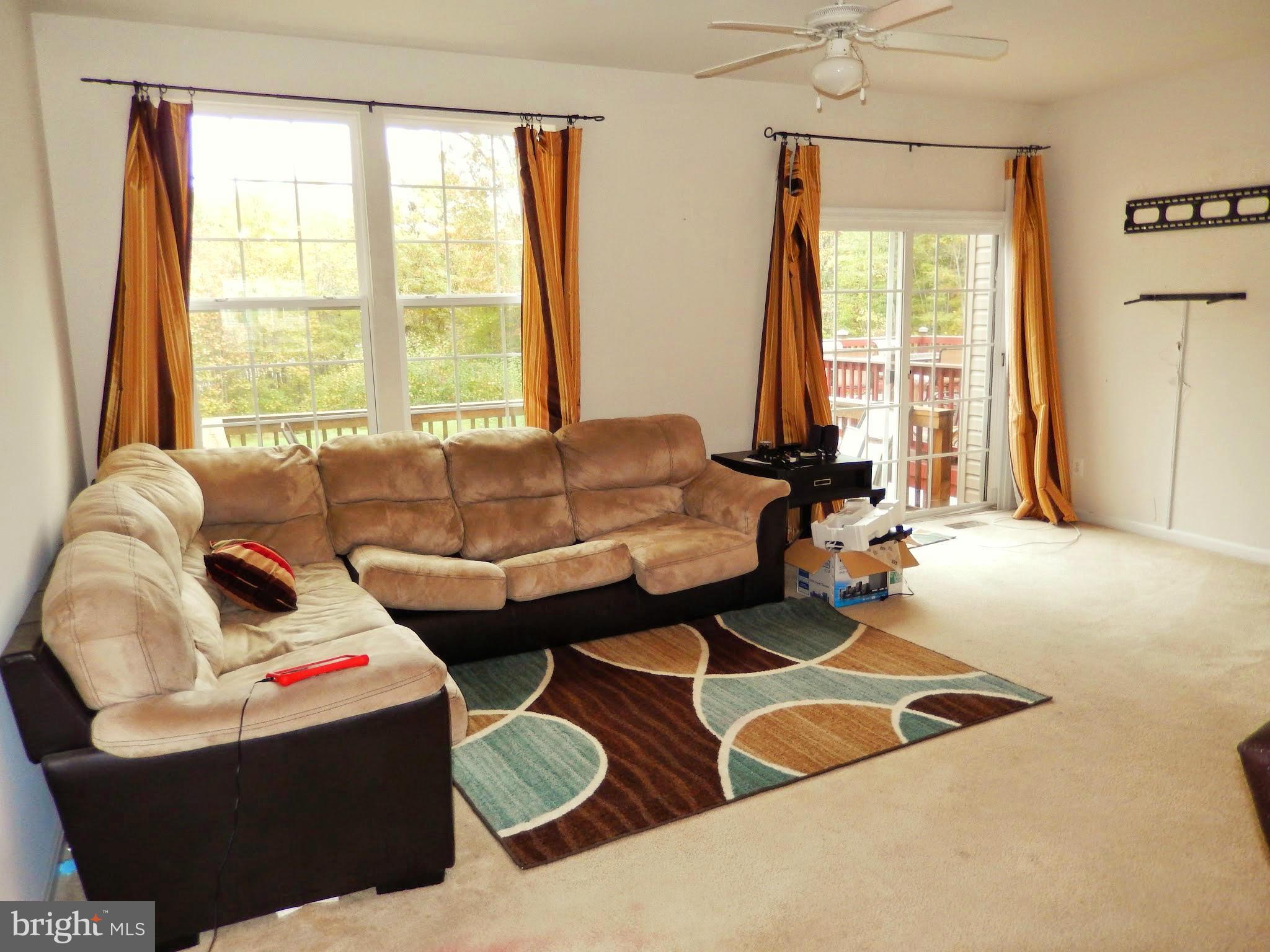 1951 Waltman Road Edgewood, MD 21040 - Photo 9 of 20 a living room with furniture and a large window