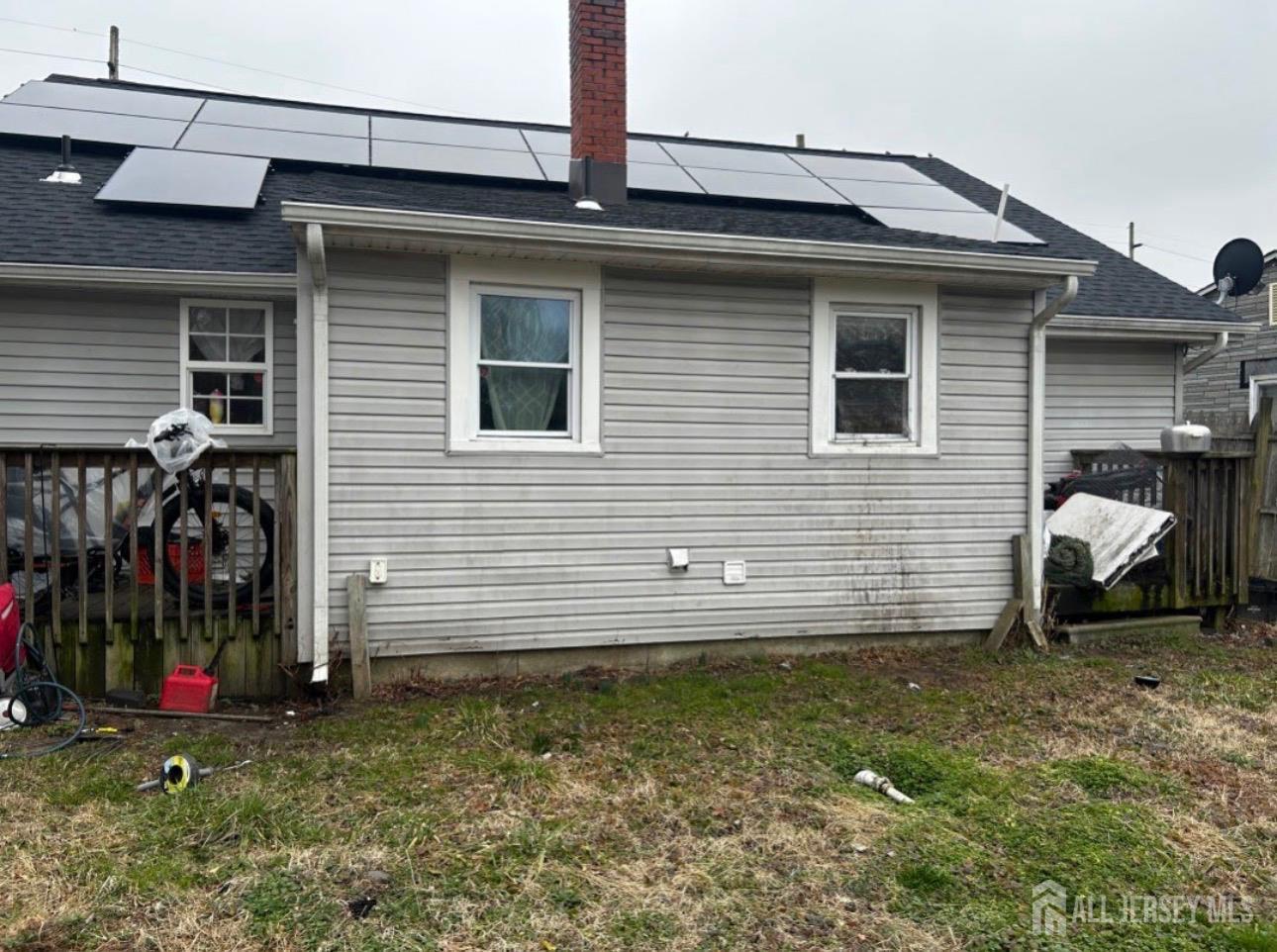 152 Broad Street Carneys Point, NJ 08069 - Photo 3 of 5 a view of a house with backyard