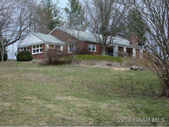 78 Haytie Road Swoope, VA 24479 - Photo 1 of 21 a front view of a house with a yard