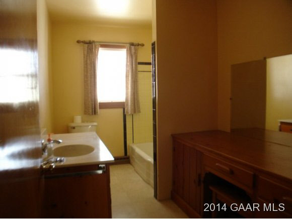 78 Haytie Road Swoope, VA 24479 - Photo 12 of 21 a bathroom with a sink a mirror and a bathtub