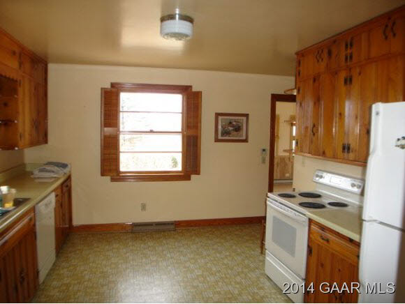 78 Haytie Road Swoope, VA 24479 - Photo 3 of 21 a kitchen with stainless steel appliances granite countertop a stove and a refrigerator