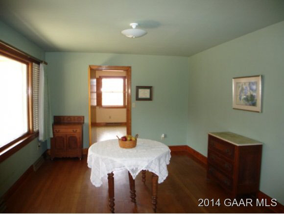 78 Haytie Road Swoope, VA 24479 - Photo 5 of 21 a bed sitting in a bedroom next to a window