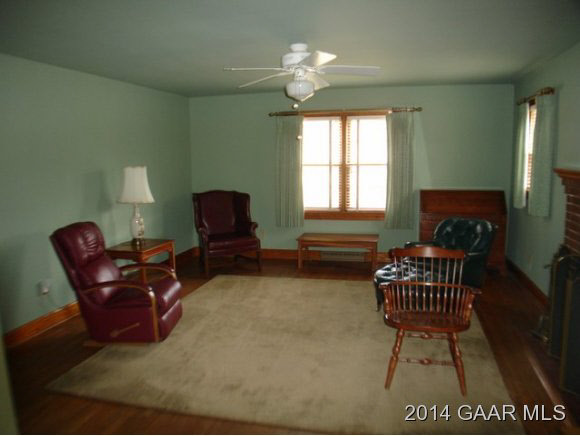 78 Haytie Road Swoope, VA 24479 - Photo 6 of 21 a living room with furniture a lamp and a window