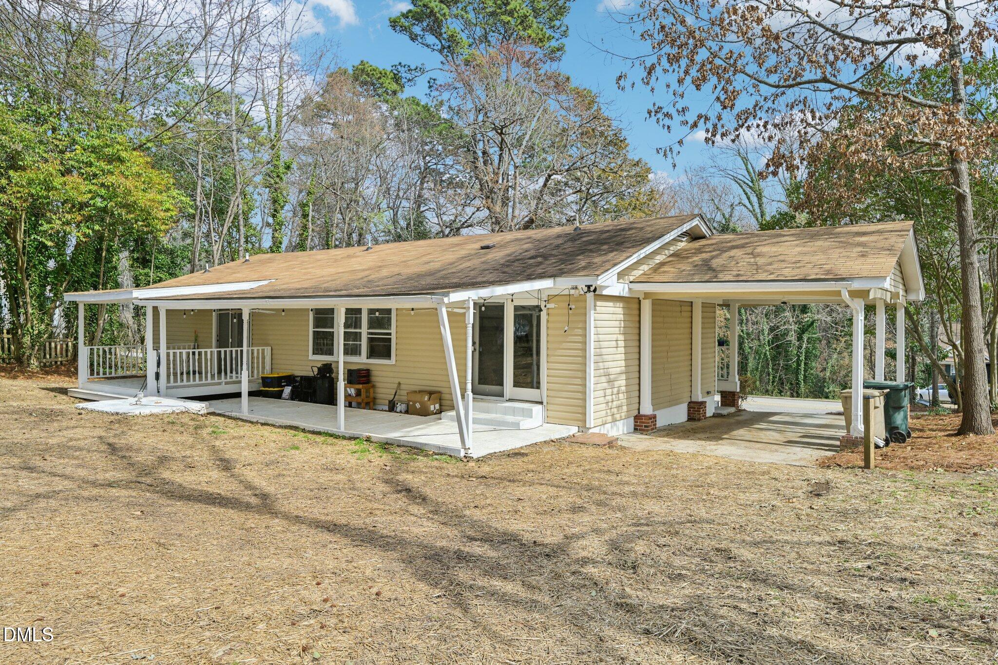 131 Creech Road Garner, NC 27529 - Photo 14 of 18 a house with yard in front of it