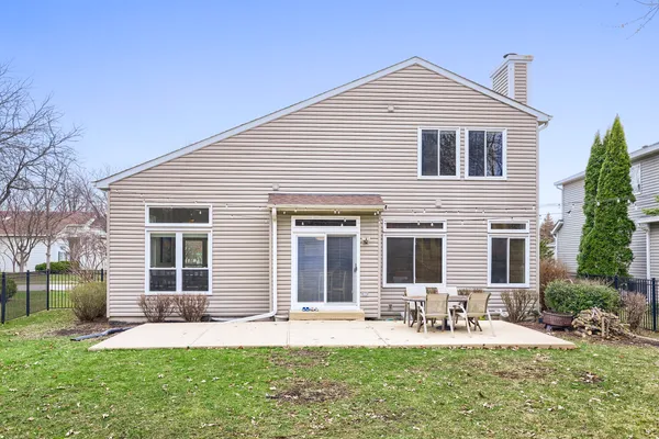 a front view of house with yard outdoor seating and yard