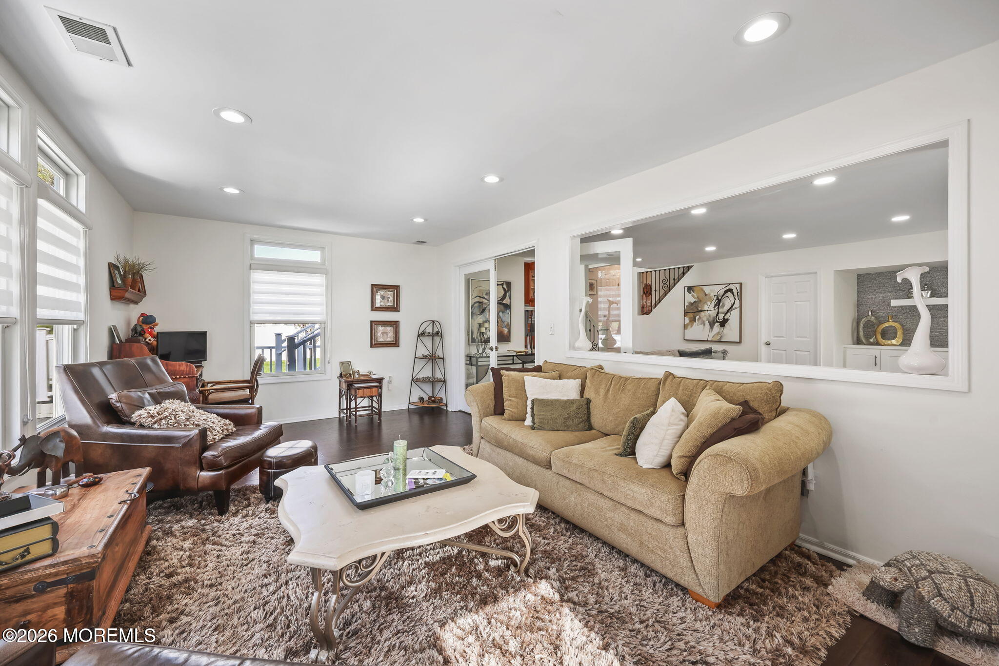 20 Colts Run Marlboro, NJ 07746 - Photo 11 of 44 a living room with furniture and a table