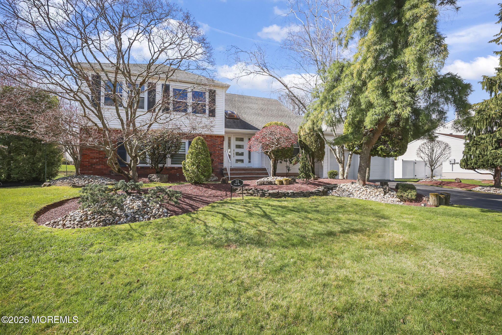 20 Colts Run Marlboro, NJ 07746 - Photo 2 of 44 a view of a house with a yard
